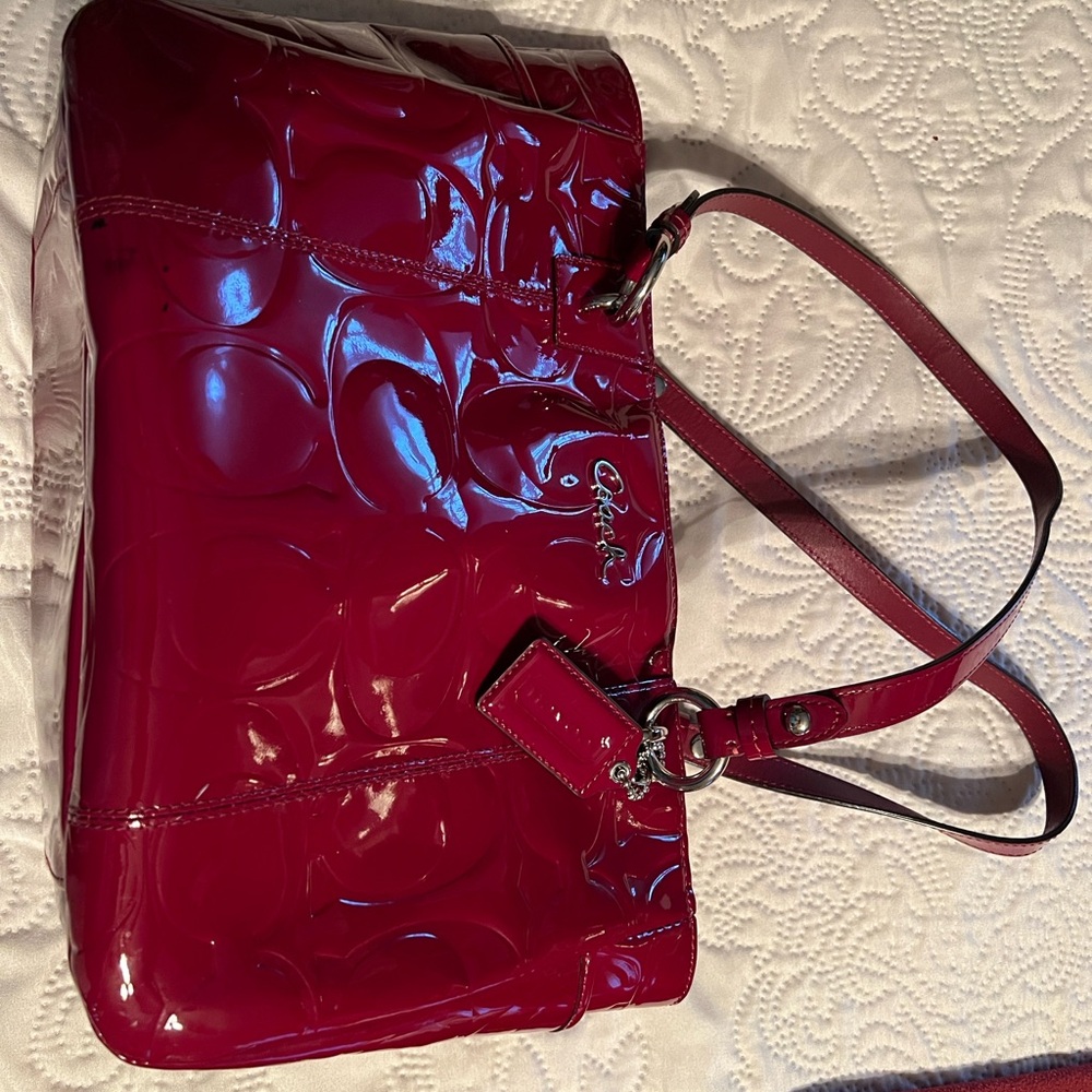 Coach Red Shoulder Bag with Glossy Finish and Embossed Design